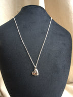 Collana con cuore liscio e zirconi trasparenti - argento bianco