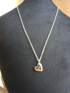 Collana con cuore liscio e zirconi trasparenti - argento bianco