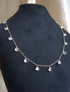 Collana girocollo Ciondolini con cuori di zirconi trasparenti - oro giallo