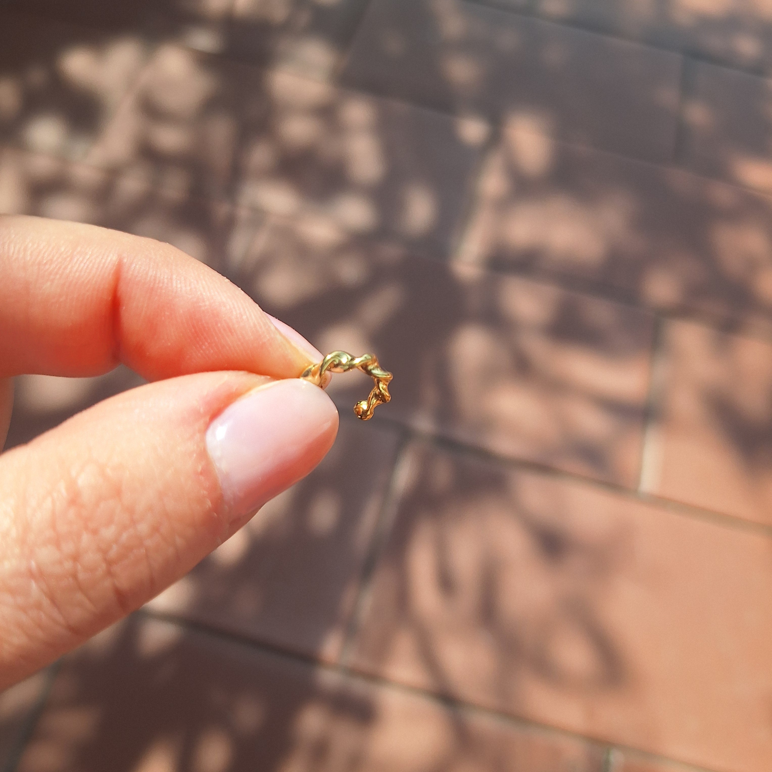 Ear Cuff ritorto placcato oro giallo